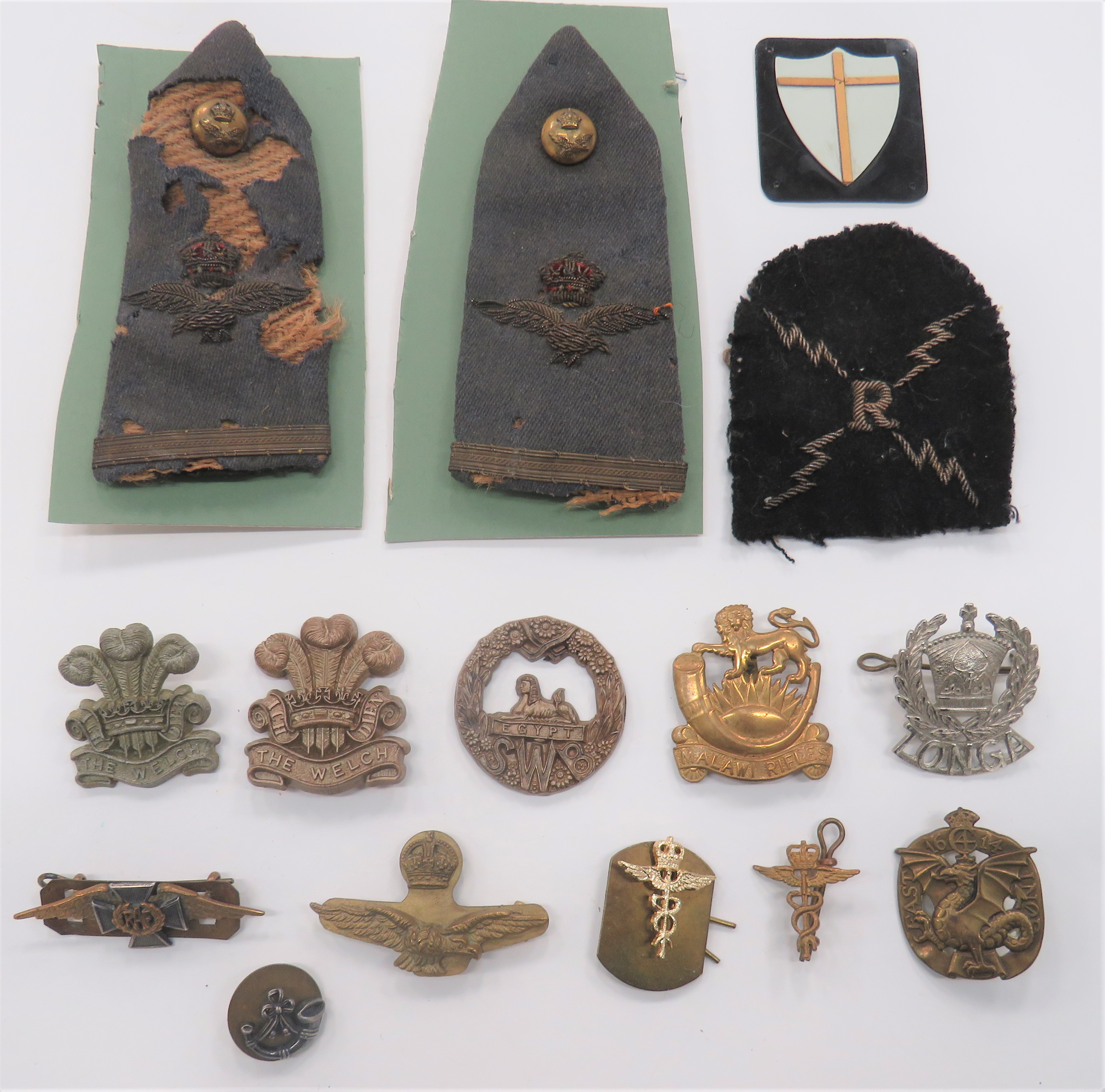 Small Selection of Various Badges including 2 x plastic economy, WW2 The Welch (blades.  Slight