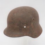 WW2 German M35 Double Decal Steel Helmet now in shed find condition.  Traces of original green