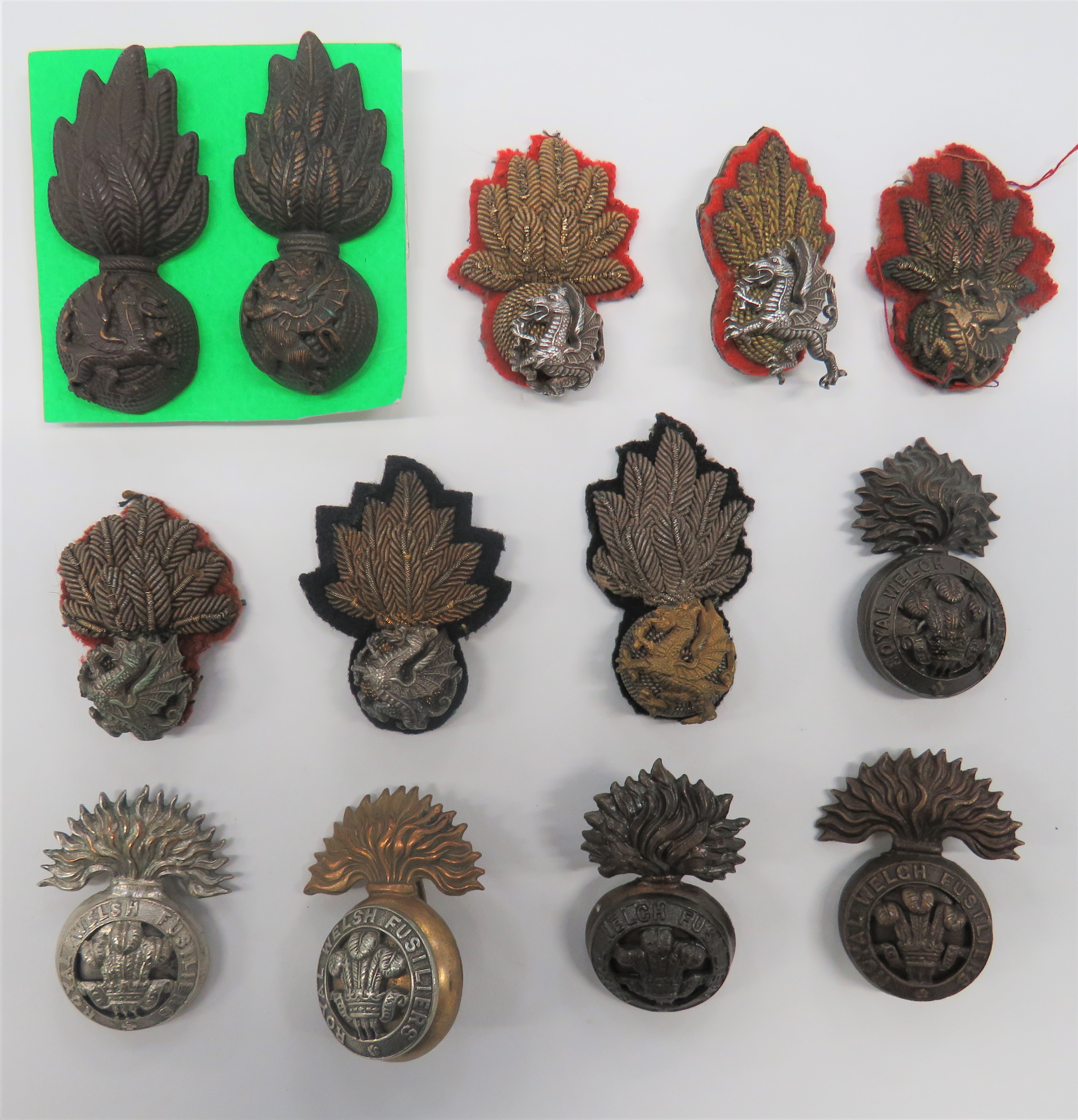 Royal Welsh Fusiliers Officer Badges including bullion embroidery and silvered dragon set on a