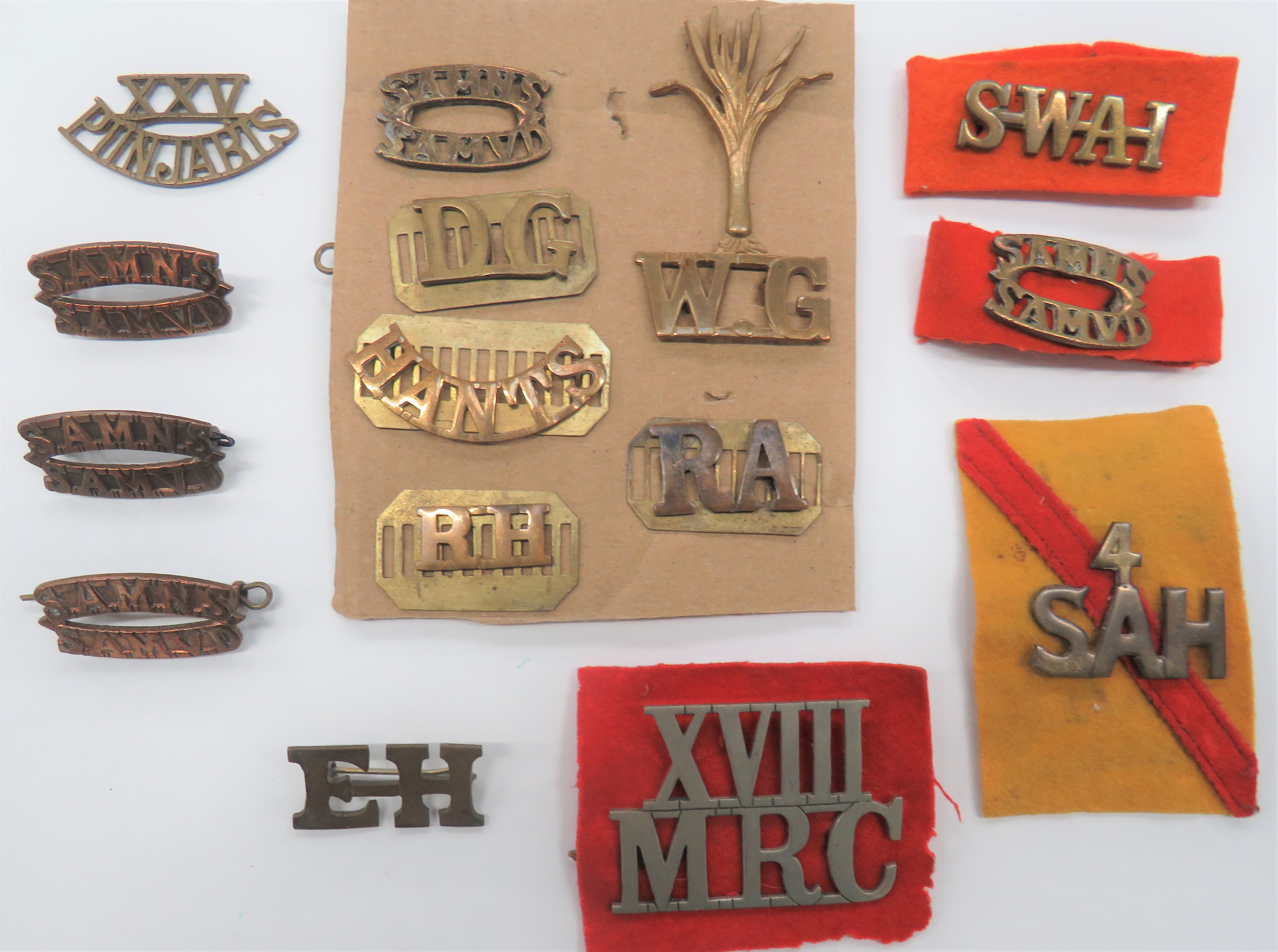 Shoulder Titles Including South African  brass titles include 4 SAH on yellow felt backing ...