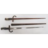 Two French M1874 Gras Bayonets 20 1/2 inch, single edged, T section blade.  Spine with maker "