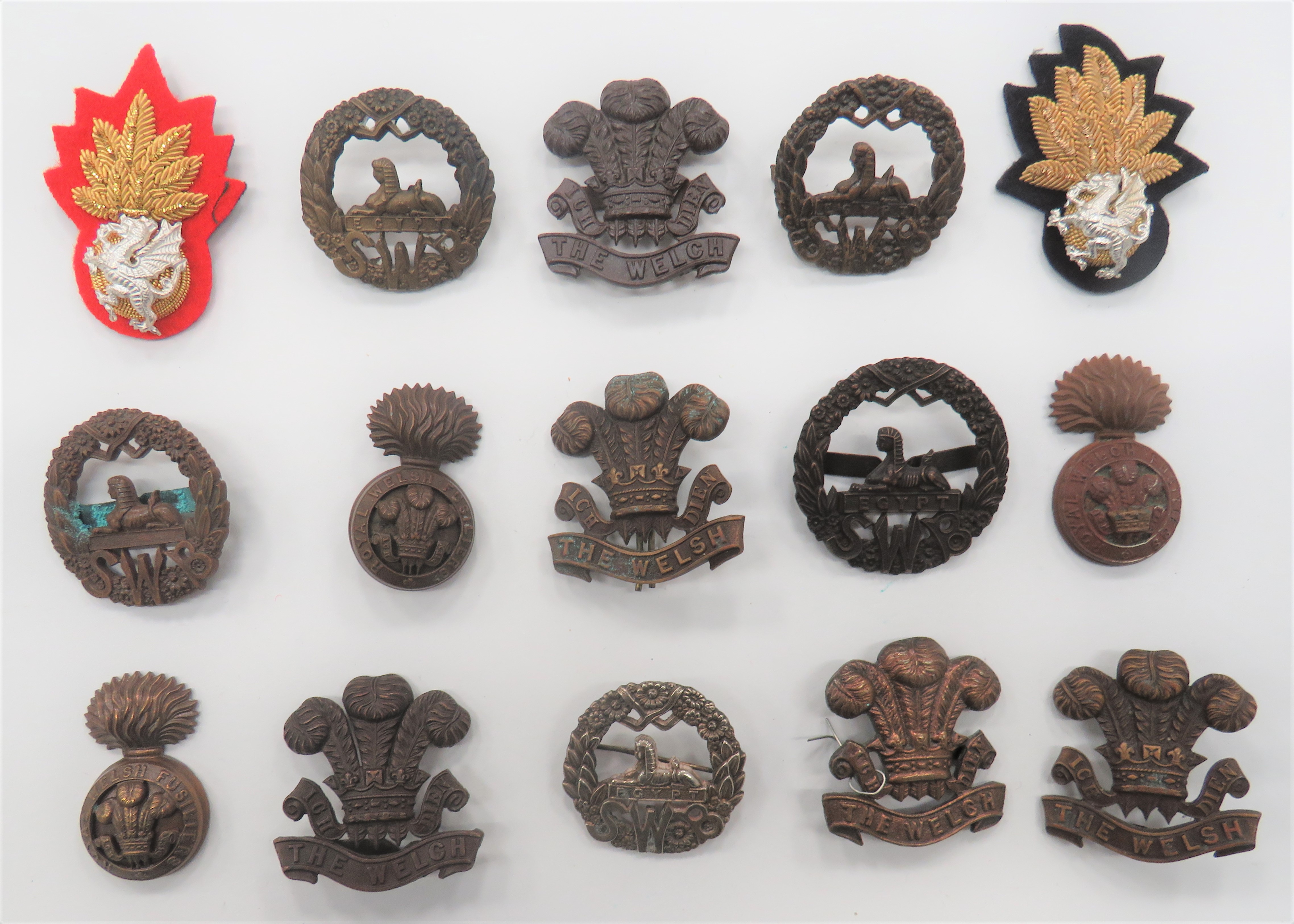 Selection of Welsh Regiments Officer Badges cap including bronzed The Welch (blades) ... Bronzed SWB