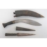 Indian Kukri and African Knife mid 20th century, Indian kukri.  11 inch, single edged blade of