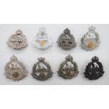 East Lancashire Cap Badges including bi-metal, Vic crown (lugs) ... Bronzed KC (blades) ... Silvered