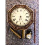 A late 19th century octagonal brass inlaid mahogany wall clock, with weight driven movement and