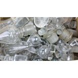 A large quantity of various glass decanter - perfume - apothecary jar and other bottle stoppers,
