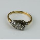 A mid-century 18ct gold and diamond twist-set ring, 1954 hallmark, size J.