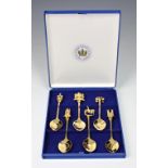 A boxed set of six 'The Queen's Golden Jubilee' gold plated teaspoons, by Collectors World, the