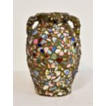 An unusual amphora style vase embellished with ceramic and glass pieces in a mosaic style, 13in. (