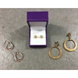 Three pairs of 9ct gold earrings, to include a pair of studs retailed by Guernsey Goldsmiths,