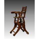 A Victorian beechwood metamorphic child's high chair, with spindle back and hinged tray,