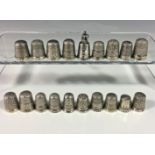 A small collection of silver thimbles, to include three by Charles Horner, gross weight 2.6 tr.