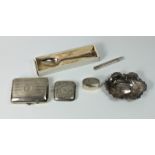 A collection of silver smalls, comprising an Edwardian vesta case by T. H. Hazlewood & Co.,