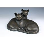 Moira Purver - 'Companions', a bronze resin sculpture depicting two cats, signed with impressed