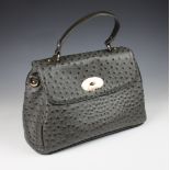 A vintage Claudia Canova grey ostrich leather bag.,