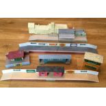 A collection of model railway buildings etc., mostly constructed from wood, some stamped 'Bailey