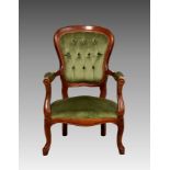 A beechwood open showframe armchair, modern, upholstered in green velour.