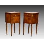 A matched pair of French inlaid walnut and marble bedside cabinets, late 19th / early 20th