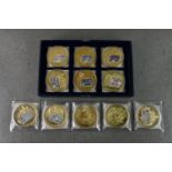 A collection of eleven 2010 banknote coin/medallions with certificates.,