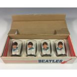 The Beatles memorabilia - A rare boxed set of four glasses by Joseph Lang & Company Ltd for NEMS