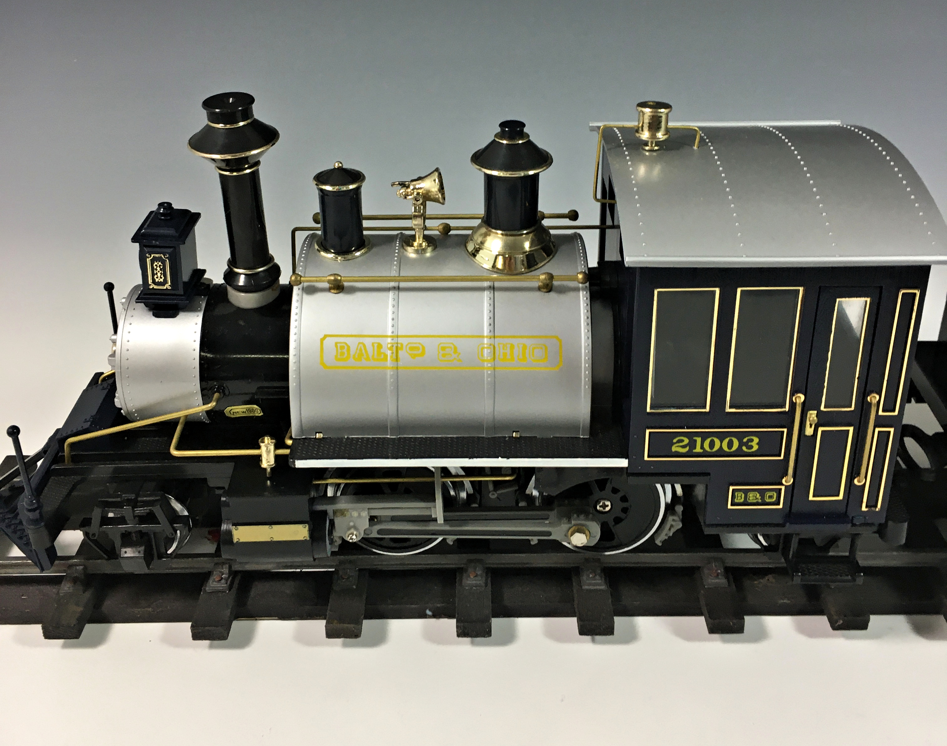 A boxed G scale REA B&O Rodgers steam locomotive and tender, REA-21003, with loose track. - Image 4 of 5