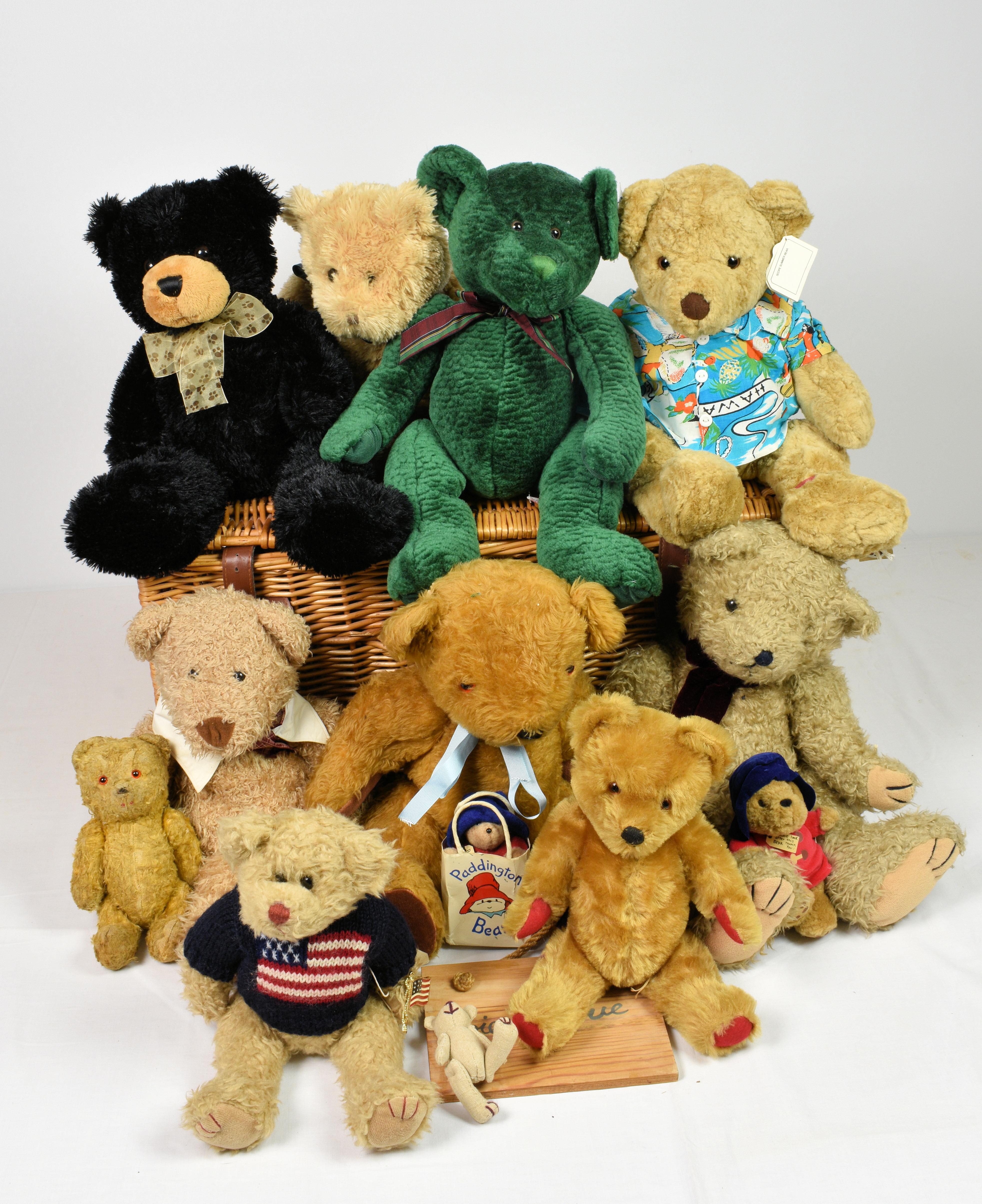 A large collection of various vintage teddy bears, to include a green Russ bear with original label;