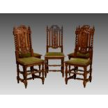 A set of five Victorian carved oak Carolean style chairs, with fruiting vine, foliate and