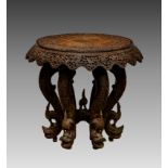 An Anglo-Indian carved hardwood occasional table, late 19th / early 20th century, the circular top
