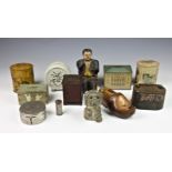 A collection of vintage and antique money boxes / banks, including a 19th century North American