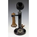An Edwardian candlestick telephone, the bakelite receiver stamped TE 234 No. 22, the metal stand