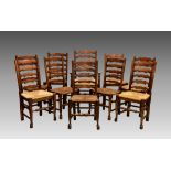 A set of ten beech and elm ladderback dining chairs, early 20th century, including one carver,