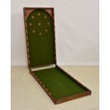 A Victorian folding table top bagatelle game, the mahogany case opening to reveal green baize