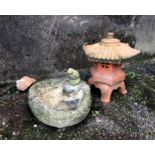 A small terracotta Chinese pavilion garden ornament, 14½in. (36.8cm.) high, together with a small