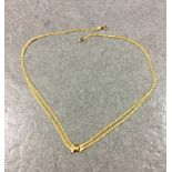 A fancy 9ct gold necklace, stamped Italy.