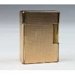 A vintage gold plated Dupont lighter.,