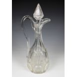 A Victorian cut and etched glass claret jug, with panel and petal cut decoration, with etched