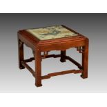 An Oriental stained beechwood glass top occasional table, second half 20th century, the glass top