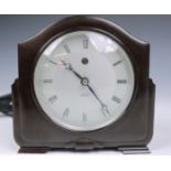 A vintage 1940's SMITH SECTRIC clock, in brown bakelite, 5 1/8in. (13cm.) high.