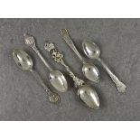 Five silver commemorative teaspoons, of various styles and dates, the largest 4½in. (14cm.) long,