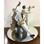 A large porcelain limited edition Lladro 'Jazz Trio', issued 2011, glossy porcelain figurine of