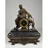 A 19th century patinated spelter figural mantel clock, probably French, surmounted with classical