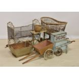 A vintage / antique basket weave trolley or pram on wheels, 23in. (58.5cm.) long, together with a