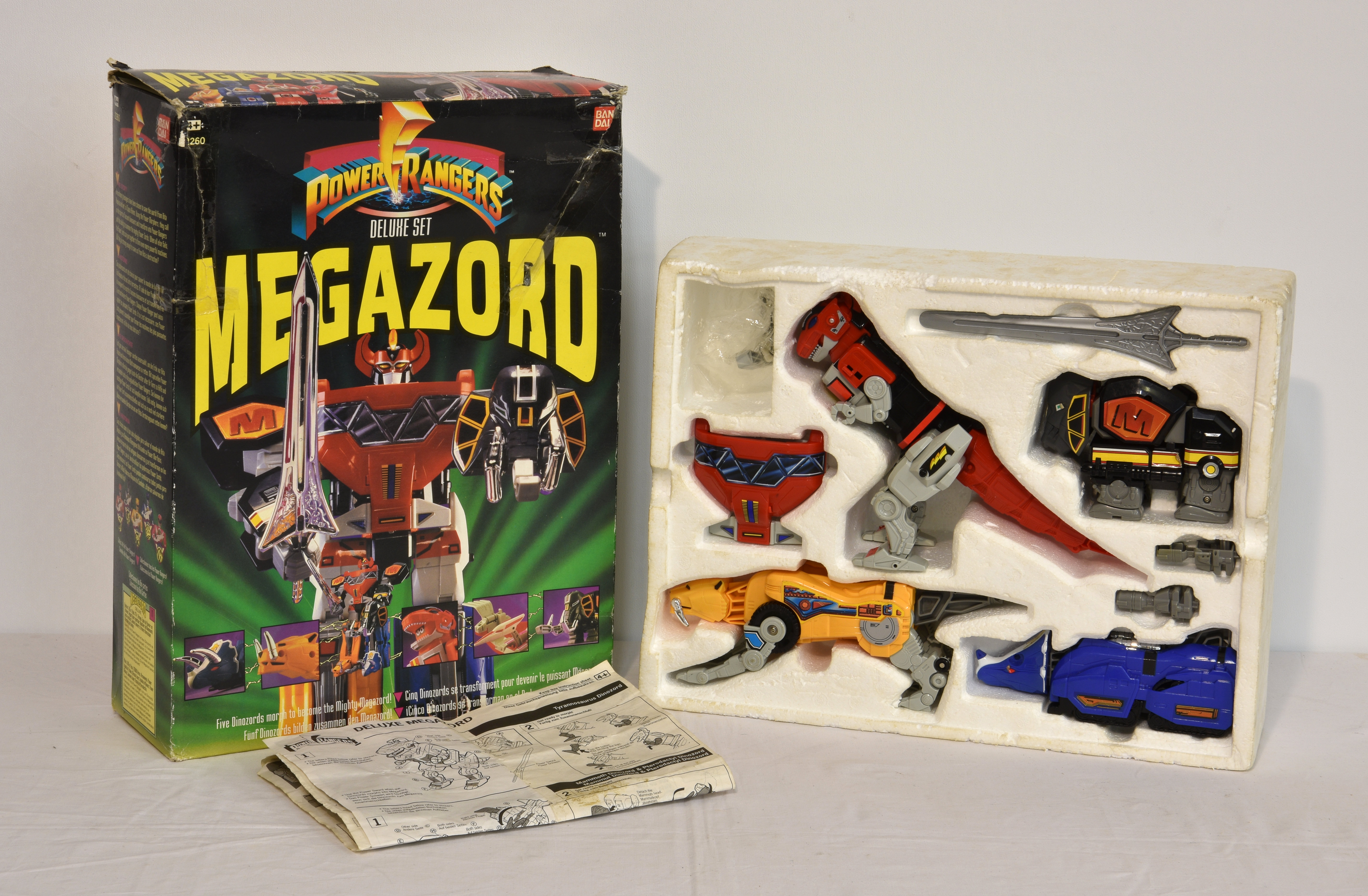 An original boxed vintage 1990s Bandai Power Rangers action figure playsets 2260 Deluxe Megazord,