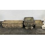 A composite stone planter, of shaped square form with lion mask corners, 15¾in. (40cm.) high,