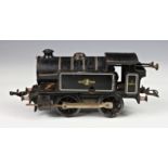 A Hornby O Gauge type 40 tank loco, 0-4-0, BR lined black 3 82011, (mechanism appears to work,