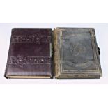 Two Victorian leather bound family photograph albums, one having inscription to front inner page -