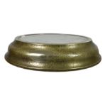 A vintage circular silver plate on planished brass and mirrored wedding cake base, of large