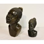 An African carved stone bust of a Tribal woman, the heavy stone figure with well detailed