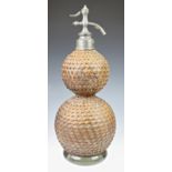 An original large double gourd form 'Selzogene' glass soda syphon by The English Syphon