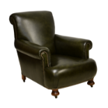 A Victorian dark green leather club armchair, well upholstered, with studded scroll arms, raised